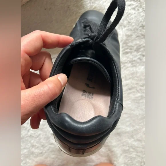 Birkenstock Black and White Sneakers with Minimalist Design - Picture 3 of 7